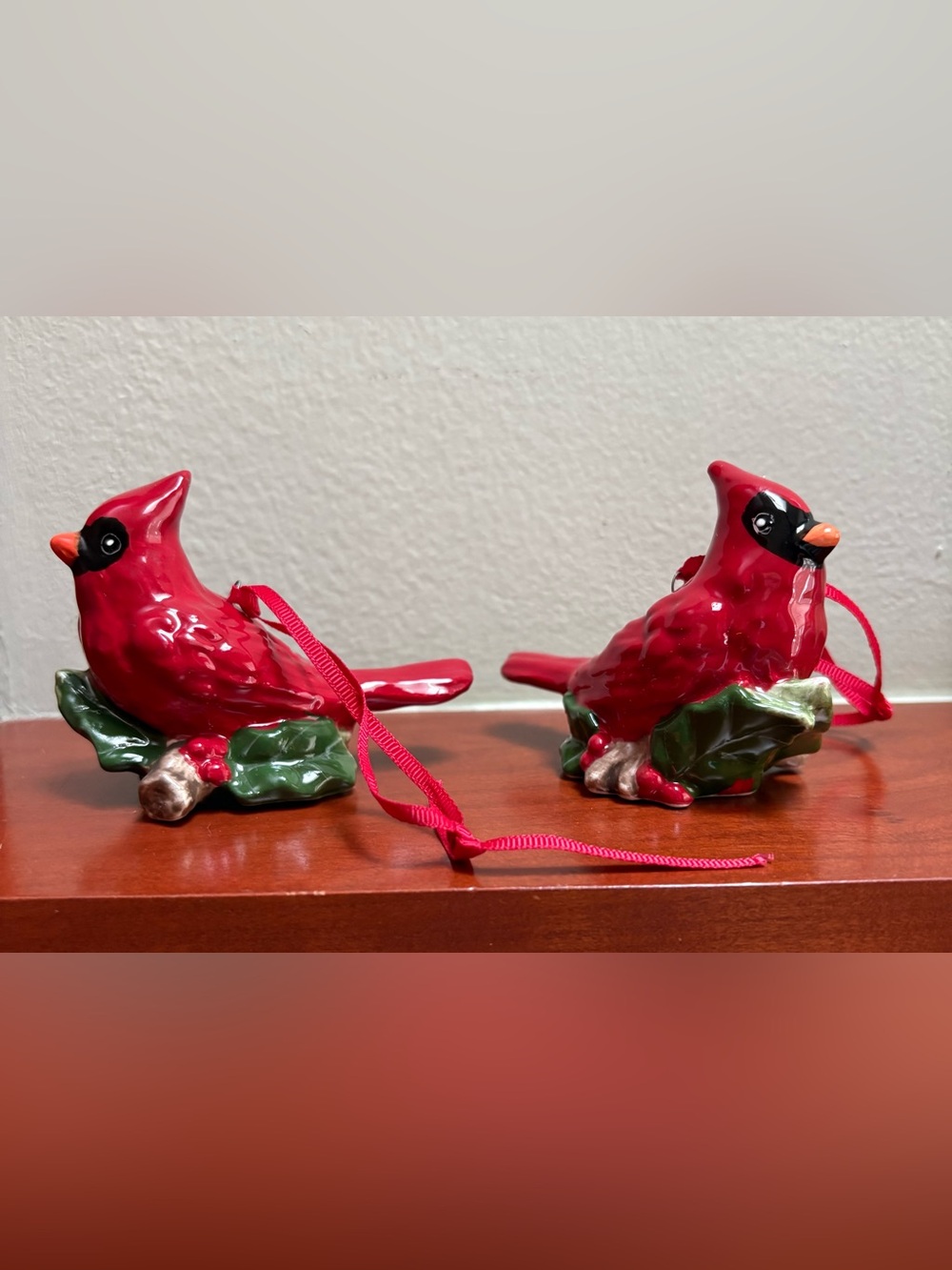 Pair of Blue Sky Clayworks Cardinals Sitting on a Holly Branch Ornaments 2020